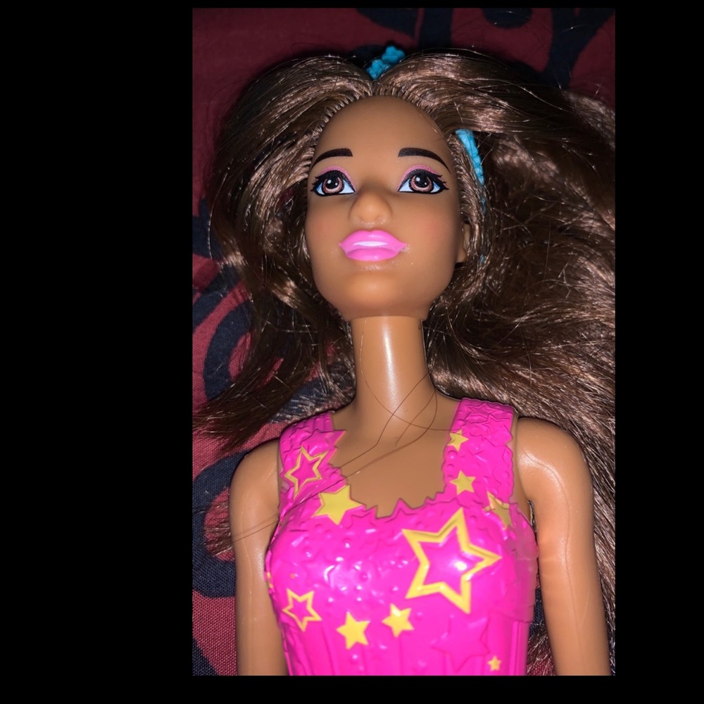 Barbie pink star suit.